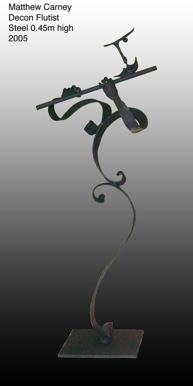 a sculpture of a person playing the flute
