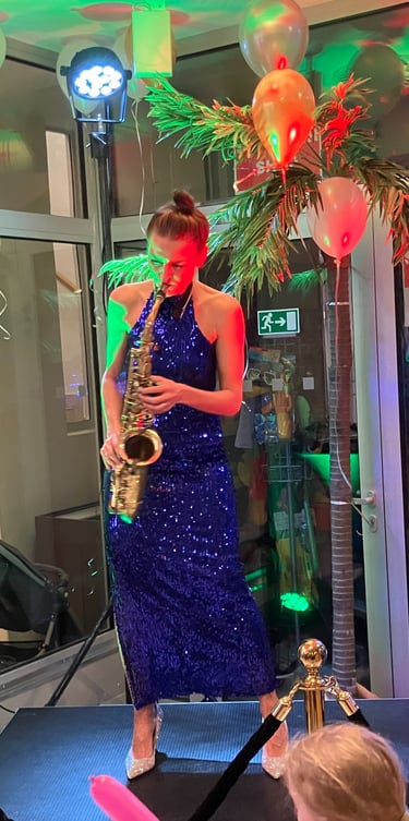 Saxiphonist warming up the new years eve crowd at the Aquapalace New Years Eve Gala Dinner, Prague, 