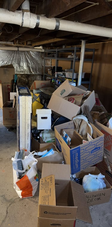 Basement clutter before junk removal cleanout project