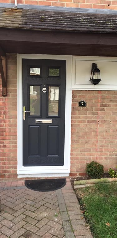 black composite front door with silver hardware fitted in Stubbington by Buildmydoor 