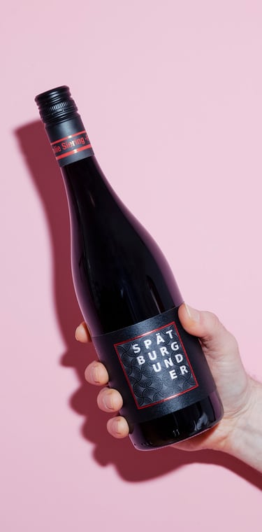 Pinot Noir bottle in a studio.