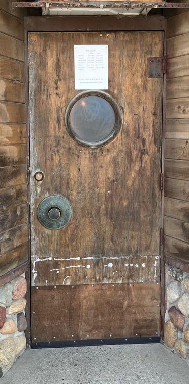 Front door to Grimm’s One More and I Gotta Go in Wautoma, Wisconsin