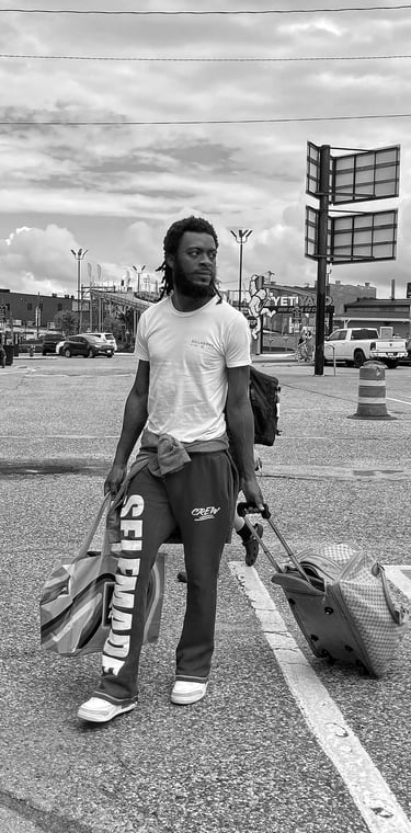 Man waiting at Amtrak Station for Empire Builder in the Wisconsin Dells. 