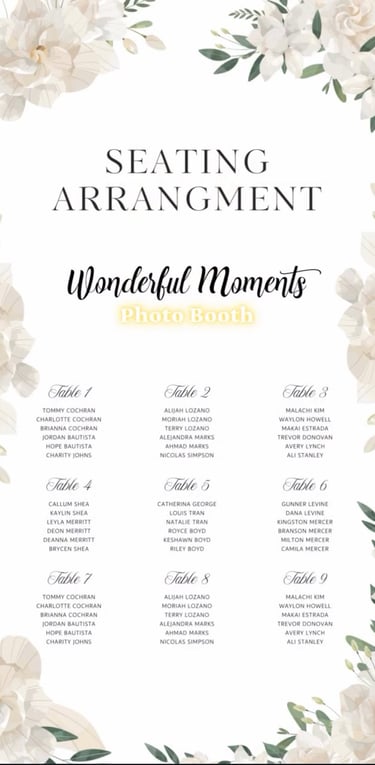 a seating seating arrangement with white flowers and greenery