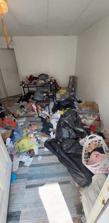 Work area being cleaned after junk removal and debris hauling