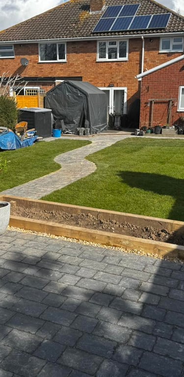 garden path cutting through a lawn in worcester garden