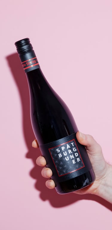 Pinot Noir bottle in a studio.