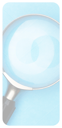 fotografía de lupa sobre fondo azul