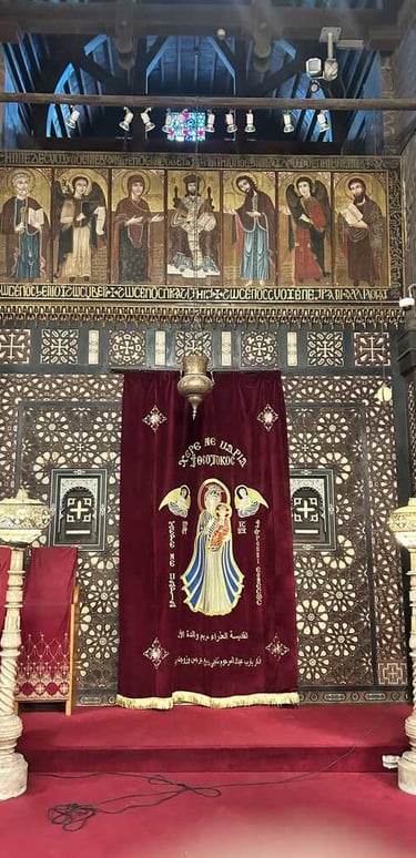 Burgundy curtain with embroidery and ornate interior of the Church of Saint Sergius and Bacchus in Old Cairo