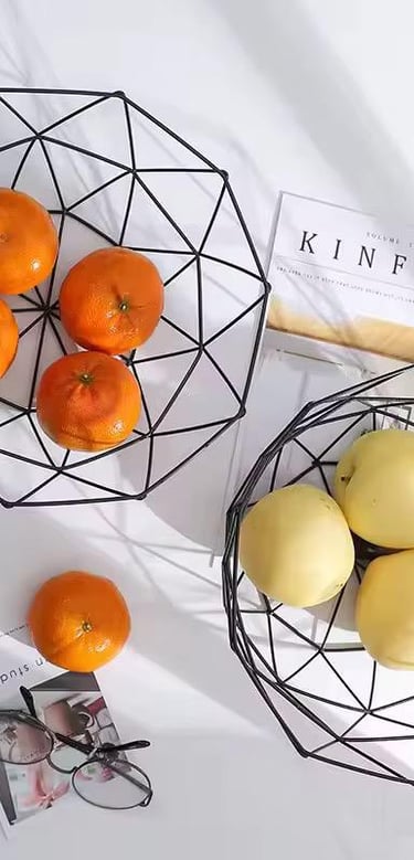 a bowl of fruit and a magazine