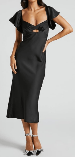 black calf length dress with cutout on stomach
