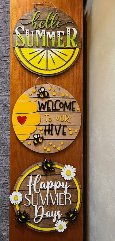 laser cut and colorfully painted wooden door or wall hangers