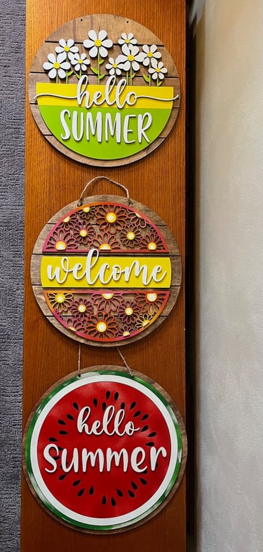 laser cut and colorfully painted wooden door or wall hangers