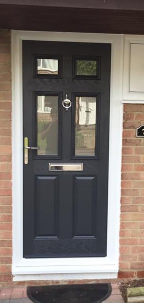 black composite front door with silver hardware fitted in Stubbington by Buildmydoor 
