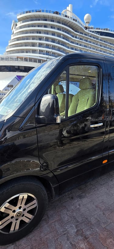 Private shore excursion van picking up cruise passengers at Tourlos New Port Mykonos.