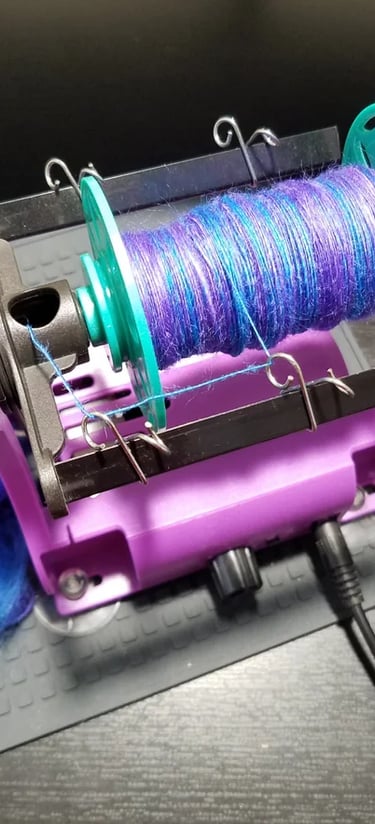 Photo of an automatic thread winder.