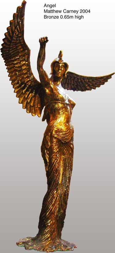 a statue of a female angel warrior