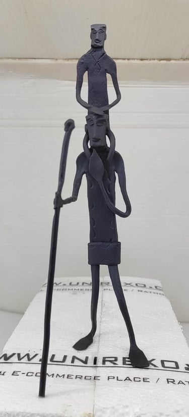 "Handcrafted Wrought Iron Tribal Figure Carrying a Child – Traditional Bastar Art, Front View-for foreign markets"