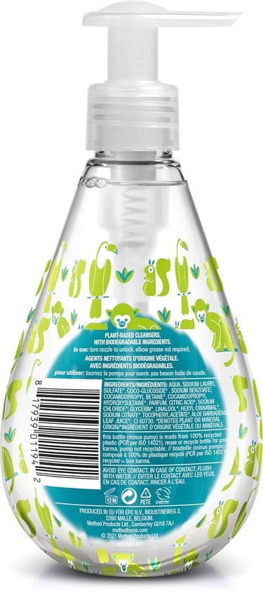 a bottle of liquid soap with a green leaf pattern