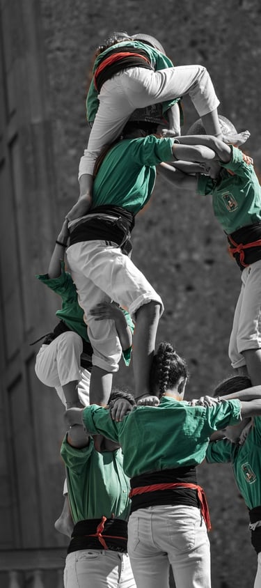 a group of people standing on top of a tower