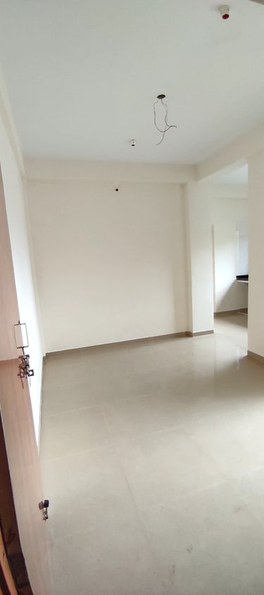 Spacious living room at Lakefield Apartments with modern interiors in Igatpuri