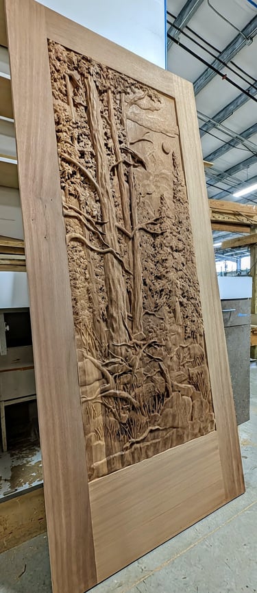 a 3d relief carved wooden door with a large wooden paneled door