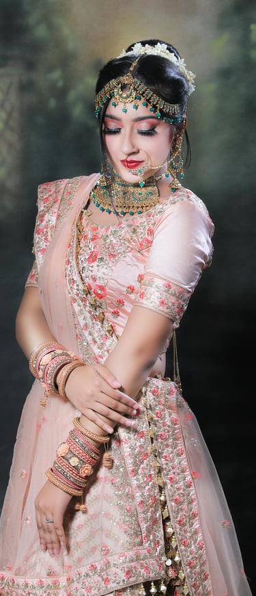 a woman in a pink dress and jewelry