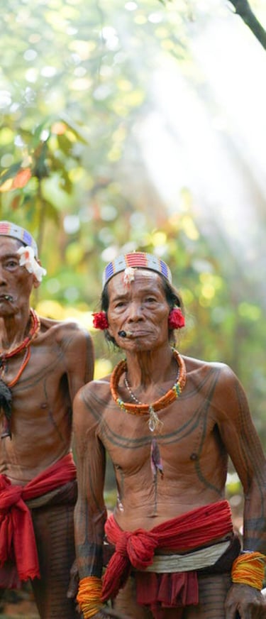 two men with tattoos on their backs