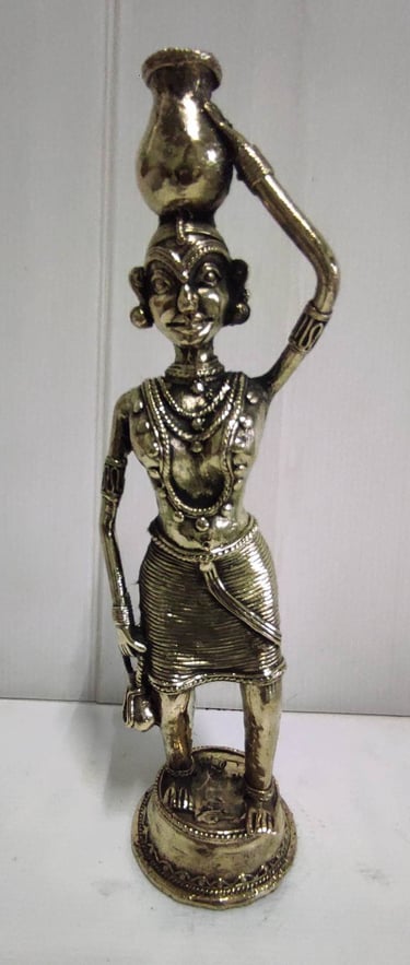 "Handcrafted brass tribal woman carrying pot on head–front view-for overseas demand"