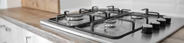 a stove top with a stove top and a stove top