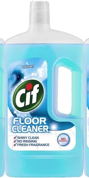 a group of three bottles of cleaners