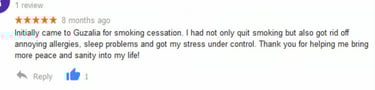 Five-star customer review for Guzalia regarding successful smoking cessation and stress management.