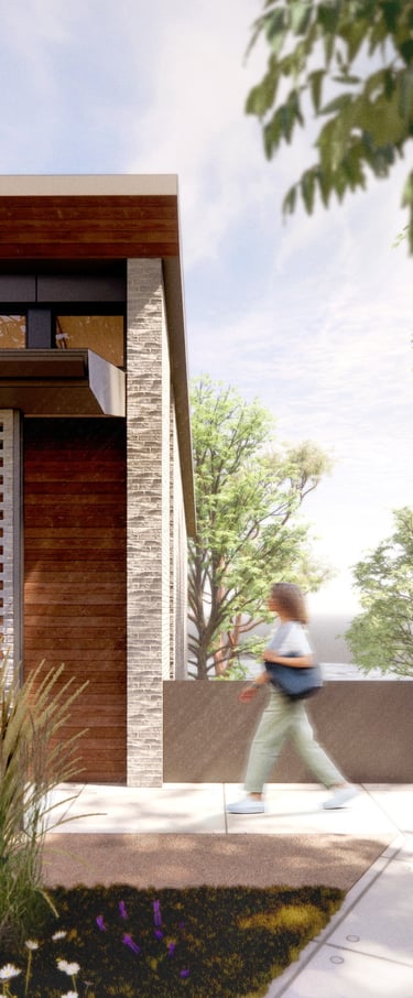 Exterior of a home, with a brick screen wall and wood accents