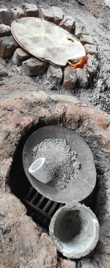 "A traditional metal pot used for melting brass during the casting process in Dhokra art, Bastar, Chhattisgarh."