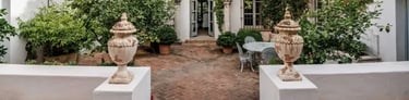 Finca Santa Katerina main courtyard with statues and balconies
