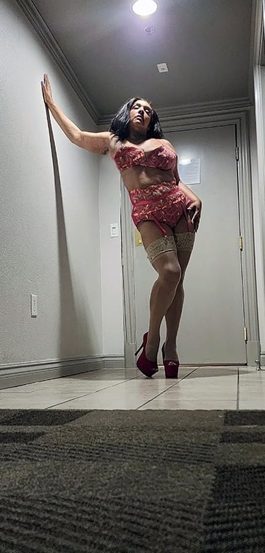 Ms Ashlie Pink matching Bra, Pantie & garter belt that has yellow flowers on it. thigh hi stockings