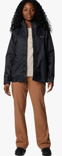 a woman in a black jacket and pants