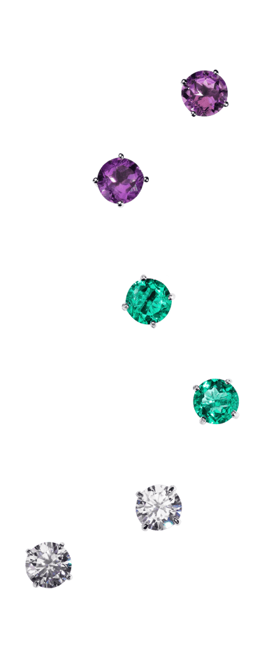 Um grupo de acessórios de moda com brincos de diversas cores