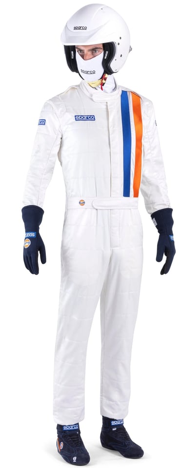 Professional driver wearing a white Sparco racing suit with Gulf stripes, helmet, and safety gear.