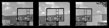 Composed image featuring a spacious vacant outdoor billboard within an commercial urban environment