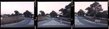 Composite color photograph of a winding road with traffic signs, captured on KODAK PORTRA film