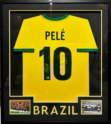 Signed Pele jersey with two 8x10 photos