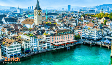 a cityscape of buildings and a clock tower