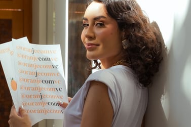 a woman holding a sign that says,'i am a woman who is not