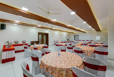 Spacious conference hall with seating arrangements 