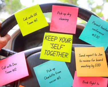 steering wheel covered in to-do sticky notes