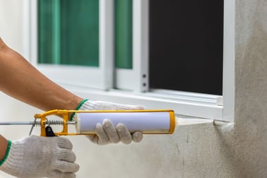 caulking a window