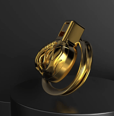 a short gold chastity cage with a golden vagina on the front
