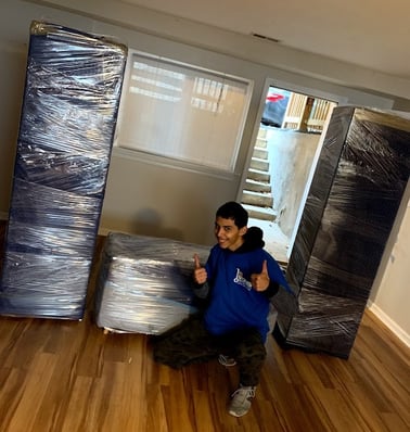 yong man wraping furniture