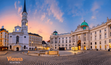 a large building with a clock tower in the middle of it